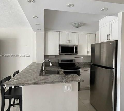 3rd image of 220 Kings Point Dr APT 303