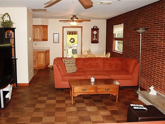 Open floor plan with access to the covered deck.