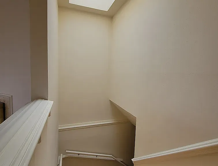 Main stair case with skylight