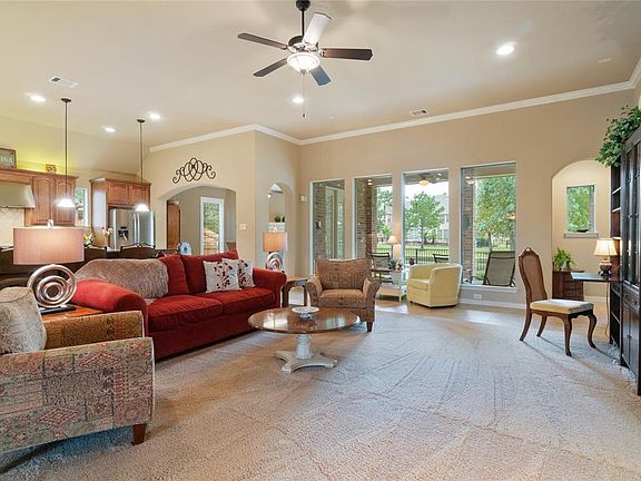 Welcome to 2406 Randal Point Ct. in The Lakes of Cypress Forest. Impressive lake views from all the windows on the back of home. The large Family/Living room opens to the kitchen and breakfast room. High ceilings with recessed lighting, in addition t