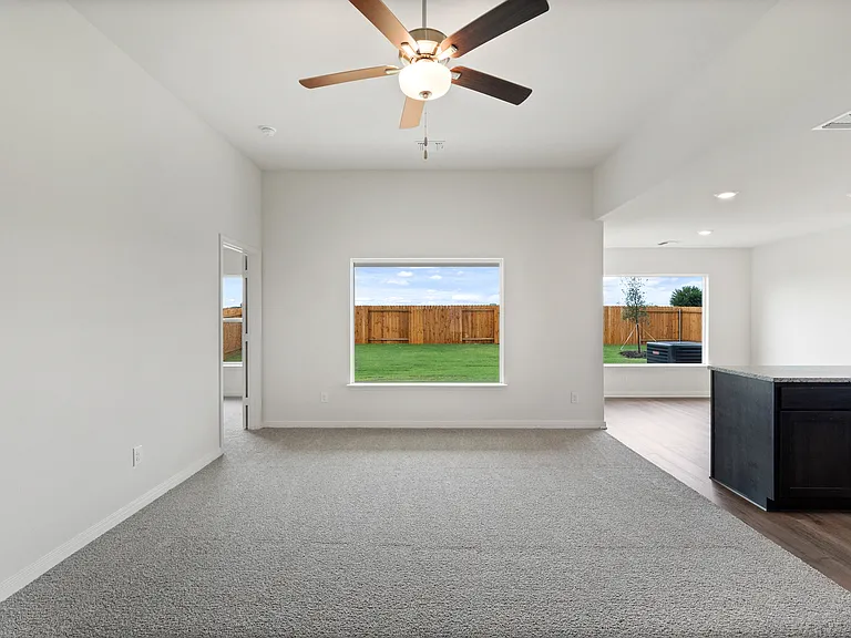 The large windows in the family room let in great, natural light and backyard views.
