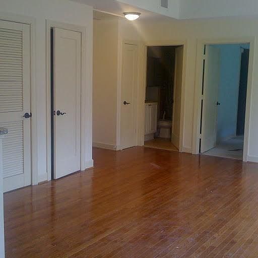 entrance to apartment. doors to coat closet bathroom, living room and W/D