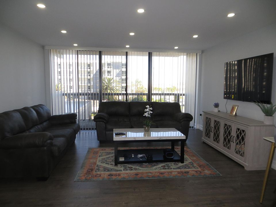 Living Room with NEW furnishings and recessed lighting