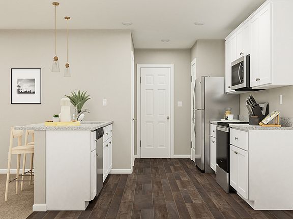 Fully loaded kitchen with stainless steel appliances