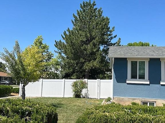 New vinyl fence around the property installed in 2022