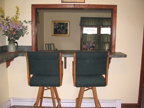 Breakfast bar is open to the dining room.
