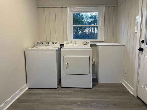 Mud room/laundry room. Coming in back door excellent storage. New washer