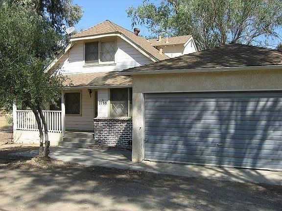 Front of Home with garage view