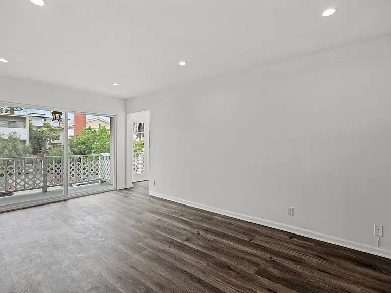 Living Room with Recessed Lighting, Vinyl Flooring, and Balcony