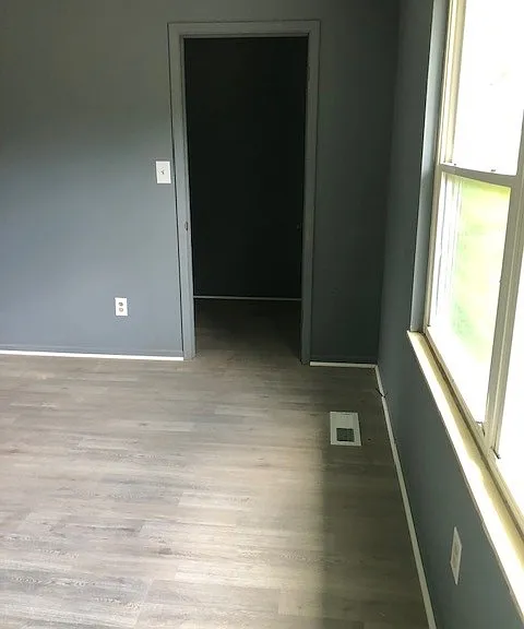 Bedroom #2 with closet and street view
