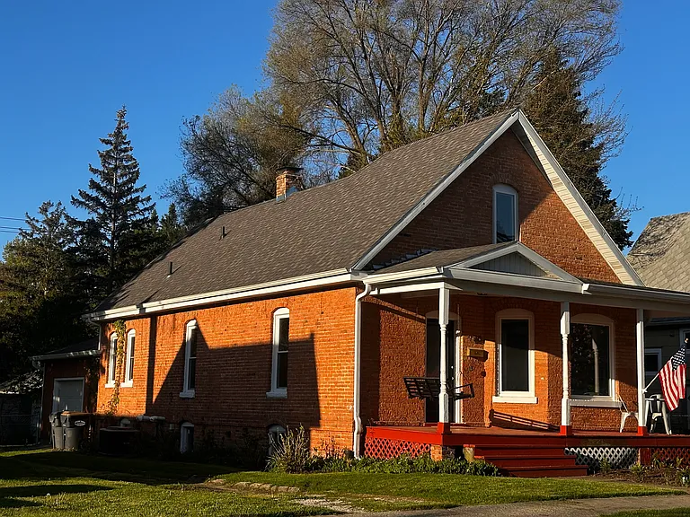 100 year old brick historical home fully renovated throughout. New windows, appliances, kitchen, bathrooms.