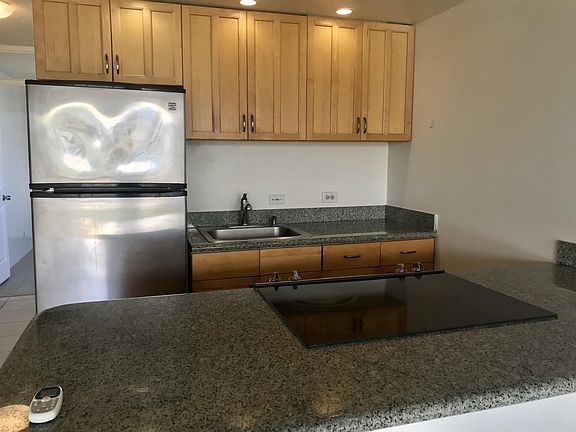 Full size refrigerator and ceramic cook top with oven