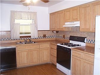 Kitchen with laminated hardwood floor