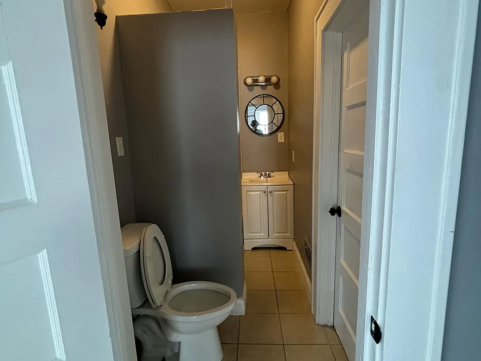 Lower level full bath and shower 116 Conestee Ave connected to master bedroom