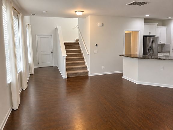 Entry way and stairs off the kitchen