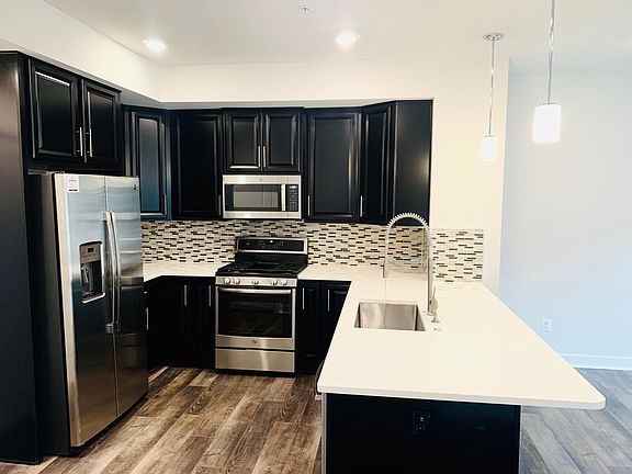 Brand New Stainless Steel Appliances with a Modern Touch to the Sink Faucet!!