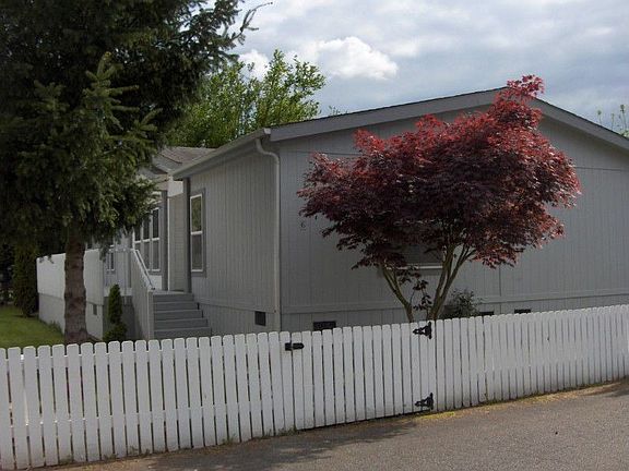 View showing entry gate and steps to front entry