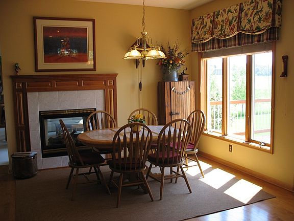 2 sided fireplace facing kitchen