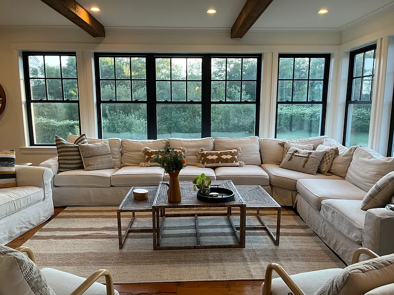 So cozy at dusk. New coffee table and new rug added fall of 2024.