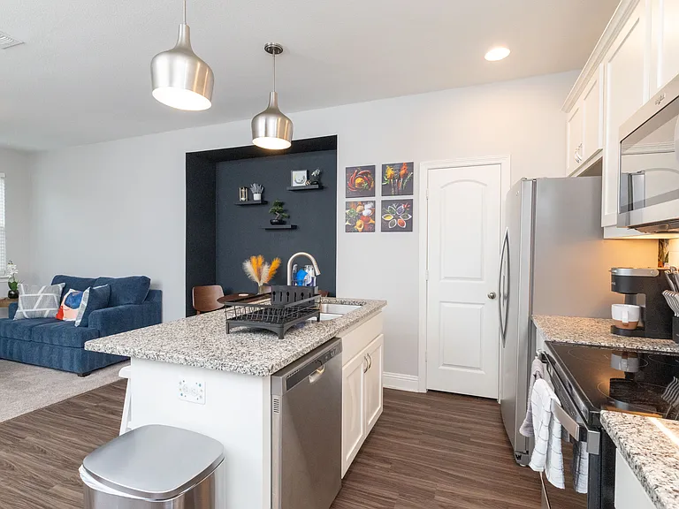 Fully stocked kitchen with all major appliances and island seating for two_ideal for cooking, dining, or sharing a morning coffee.