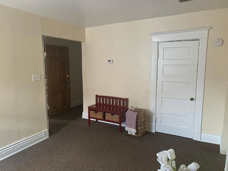 Livingroom. Large Closet. View towards front door and hallway to bedroom and bath