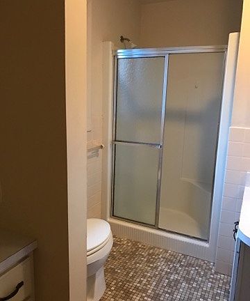 Walk in shower. Master Bath. New commode.