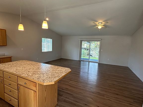 View from front door of the kitchen (to the left) and the family room.