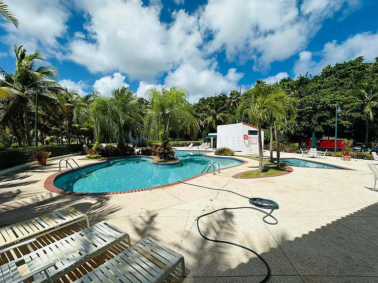 Big resort-style pool with a full recreation area