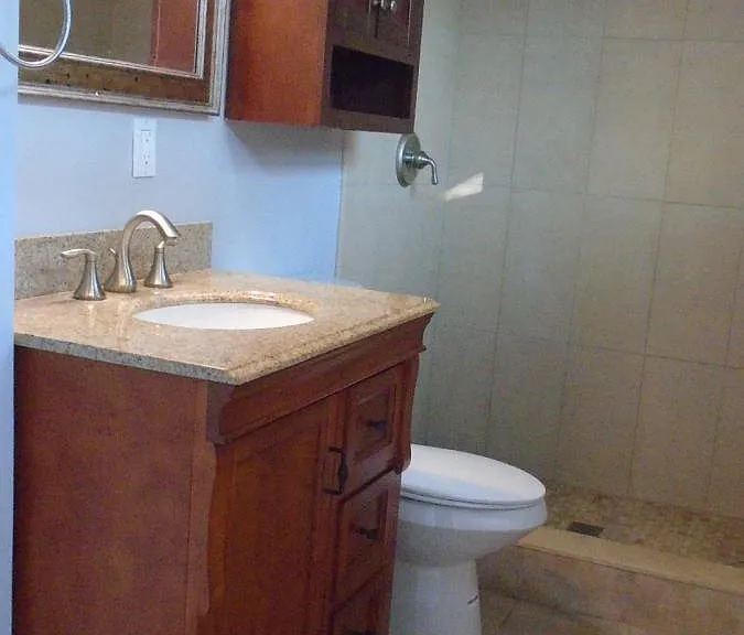 Master Bathroom with Dual Flush Toilet and Granite Counter t
