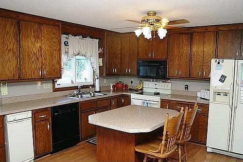 Large kitchen with Center Island and updated floors, cabinets, counter tops