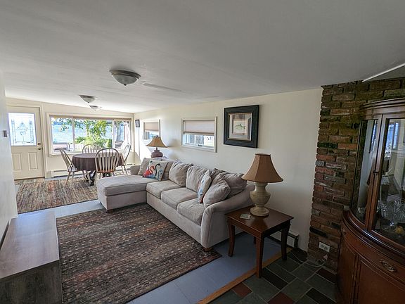 Separate family room for work space or playing games while enjoying Saratoga Lake and lower Adirondack mountain sunsets.