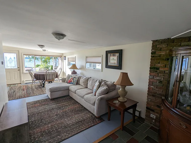 Separate family room for work space or playing games while enjoying Saratoga Lake and lower Adirondack mountain sunsets.