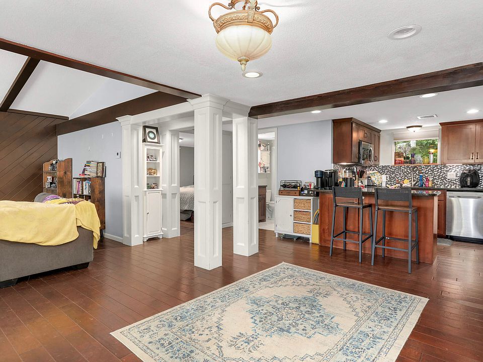 Open concept living, dining and kitchen areas