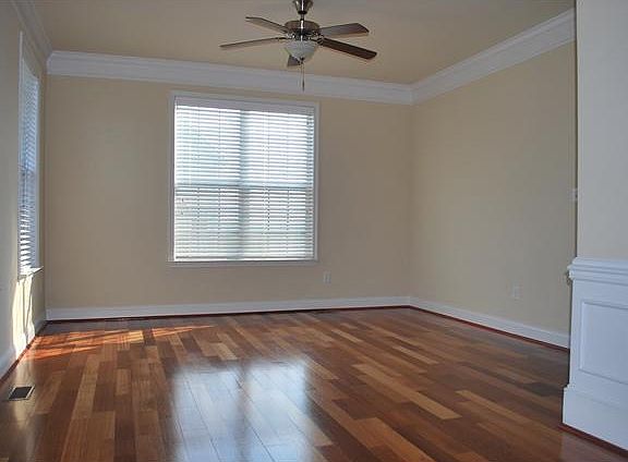 Living Rm with Hardwood Floors and Crown Moldings
