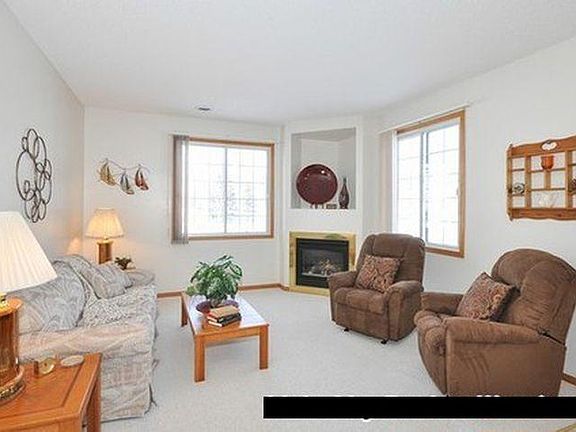 large living room with a cozy fireplace