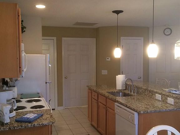 4th image of 3350 Club Villas Dr #406