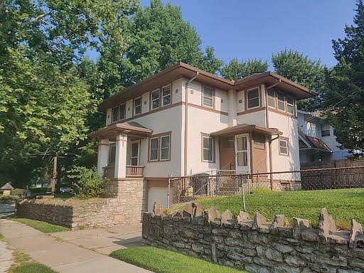 includes fenced in back yard
