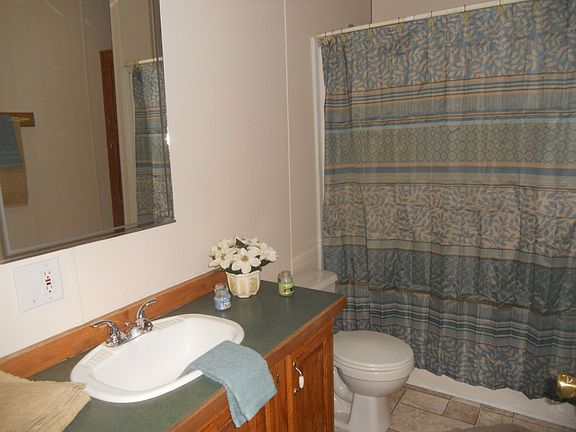 Guest Bathroom w/ Cathedral Ceilings