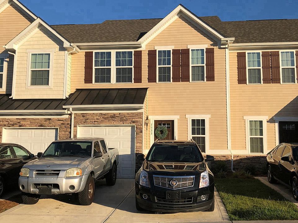 Front: 1 Car garage plus Two private parking spaces