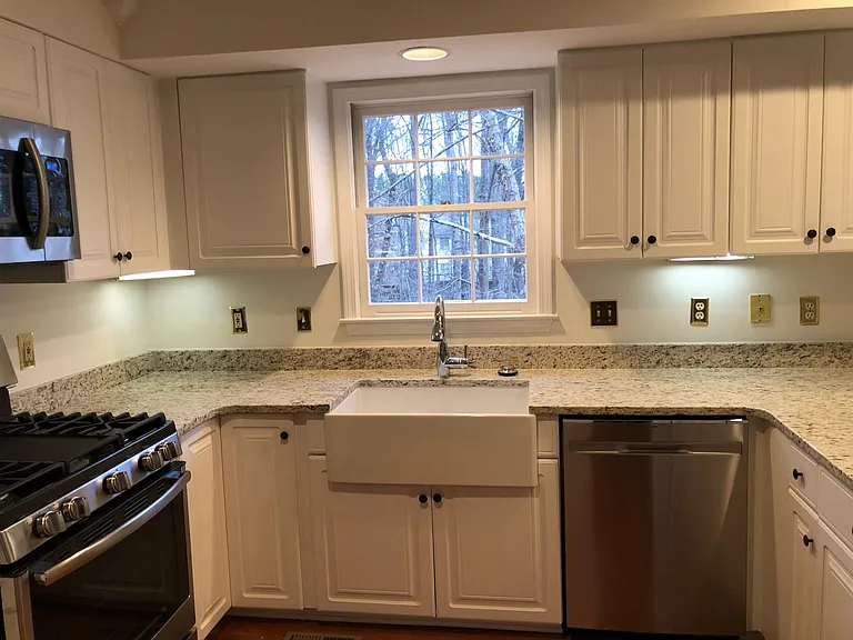 Gorgeous Farm House Sink, new granite, and new appliances in the Kitchen.