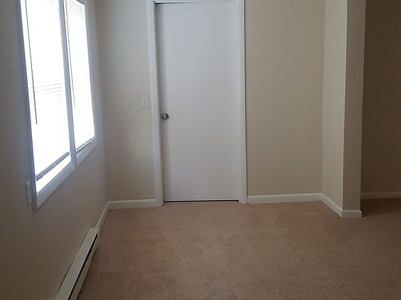 living room (showing door to front side room)