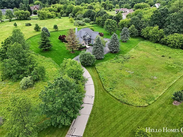 5335 Canyon River Dr NE, Ada, MI 49301