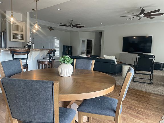 Living room and dining room. Open floor plan with abundance of natural light.