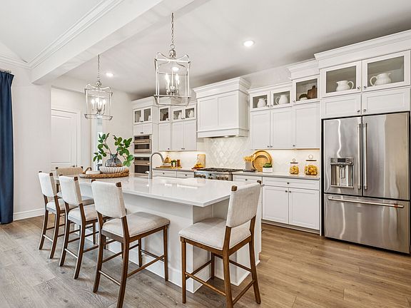 Kitchen with upper glass cabinets
