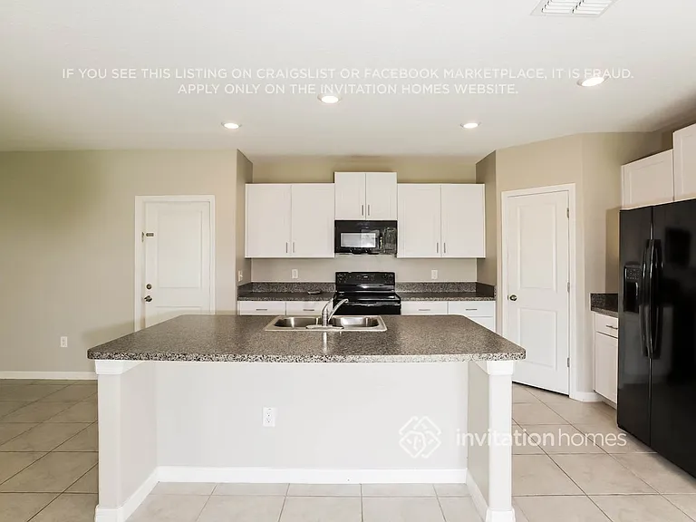 15606 Greenleaf Bay St — Photo 6