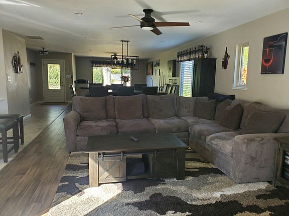 Family room, dining room, living room view from back door