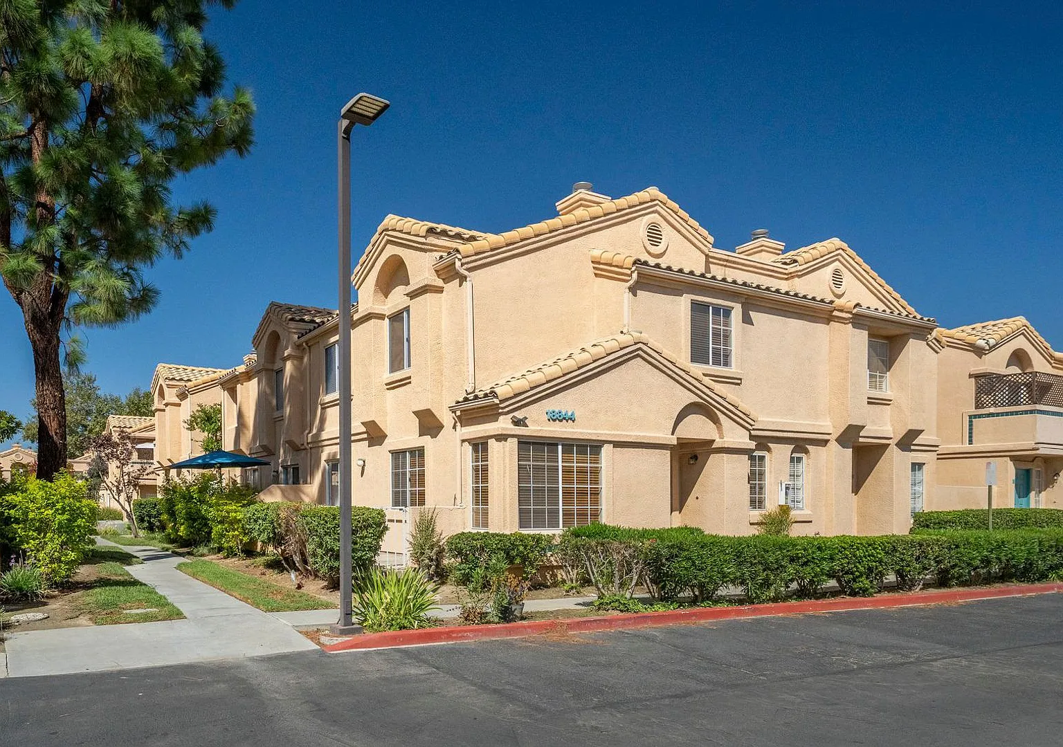 Two-bedroom upper unit within the gated community of Vista del Canon (Its Warrantable) — Photo 1