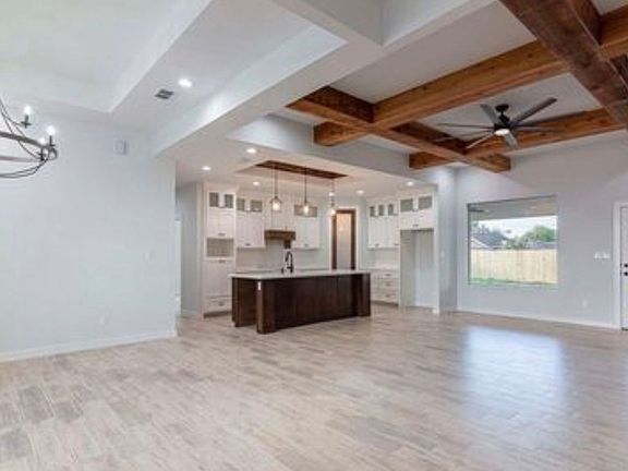 2nd image of 9348 N Queen Palm
