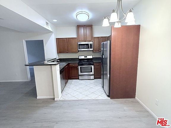 2nd image of 13941 Sherman Way Unit 204