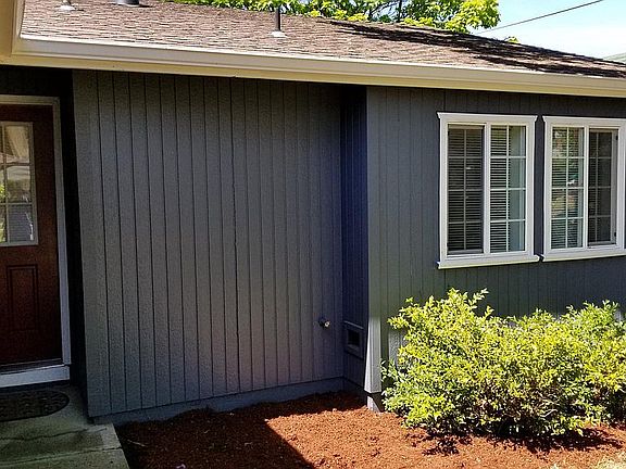 Front door and master bedroom window, June of 2018